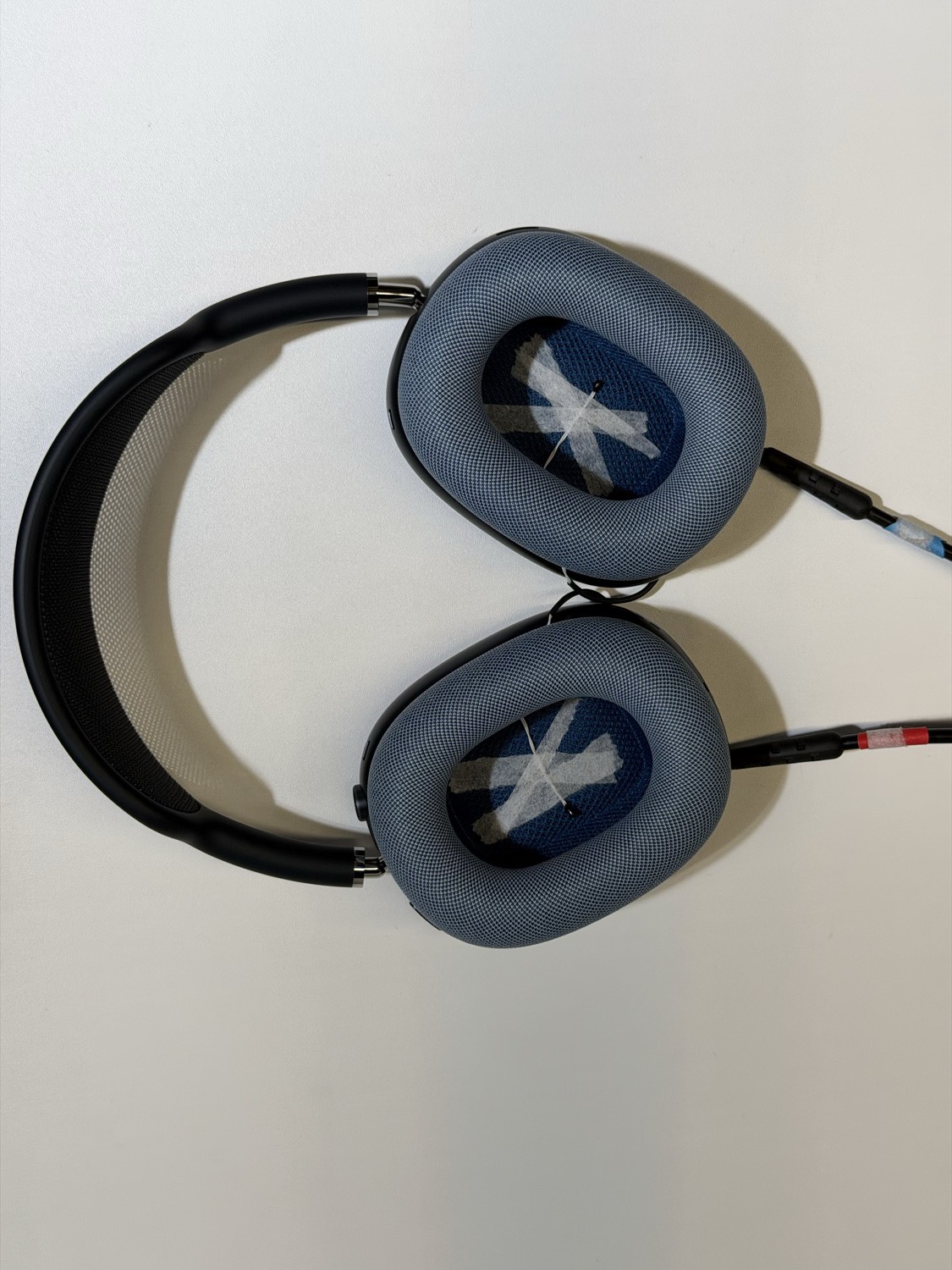 Thermocouples taped inside the ear-cups